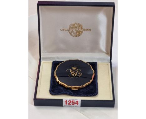 A Stratton 'Orient Express' compact mirror,&nbsp;with suede pouch and box.&nbsp; 