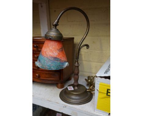 A brass and turned wood articulated table lamp, with marbled glass shade, 34.5cm high.&nbsp; 