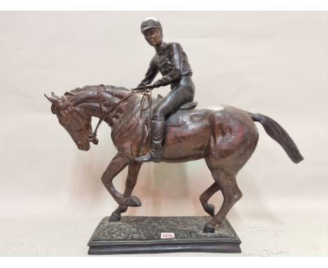 A large bronze figure group of a horse and jockey,&nbsp;54cm high.&nbsp; 