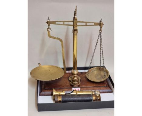 An antique lacquered brass field microscope; together with a brass and leather three drawer telescope, 47.5cm extended; and a