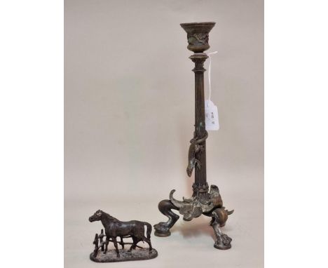 After P J Mene, a small bronze figure of Barbary stallion, 9cm wide; together with another classical style bronze candlestick