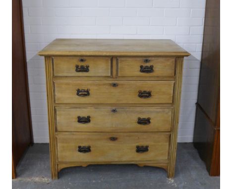Early 20th century chest, the rectangular top above two short and three graduating long drawers with Art Nouveau copper patin
