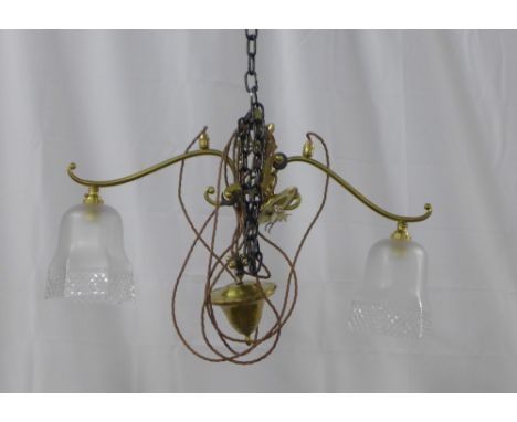 Brass rise and fall ceiling light with two arms and glass shades, approximately 60cm 