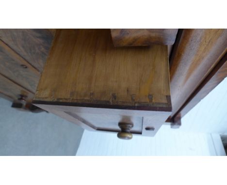 Victorian mahogany Scotch chest, inverted rectangular top over a cushion fronted long drawer and eight others flanked by scro