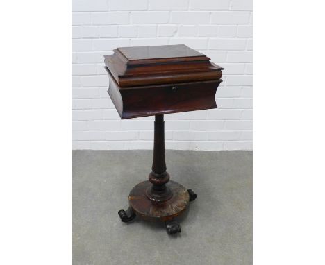 19th century rosewood teapoy, the sarcophagus top with a hinged lid opening to reveal caddy compartments and two central mixi
