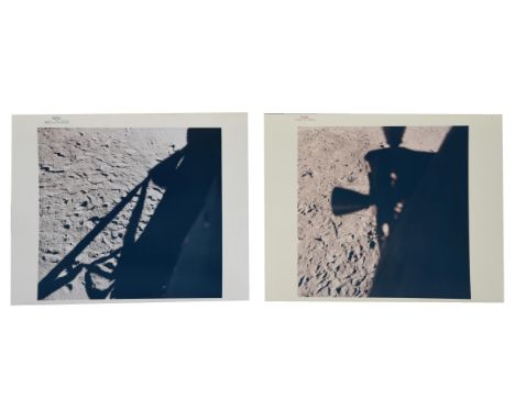 
	
		Two photographs depicting shadows of the Lunar Module silhouetted against the lunar surface, comprising:
		1) Buzz Aldri
