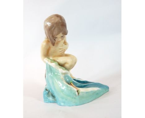 A Royal Worcester figure by F G Doughty 'August' No.3441, a young nude sitting on a rock with waves crashing against her, 14c