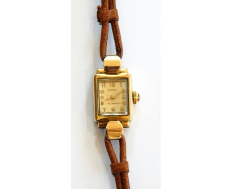Lady's Rotary 9ct gold wristwatch in rectangular case with raised arch glass face 
