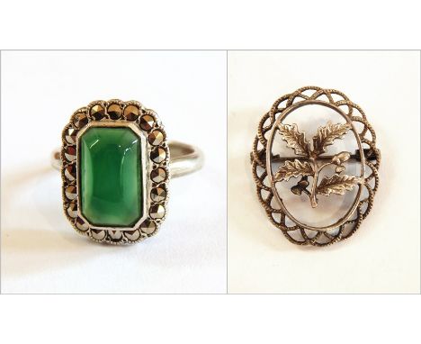 Silver green stone and marcasite ring, silver openwork oakleaf brooch and a dress ring 