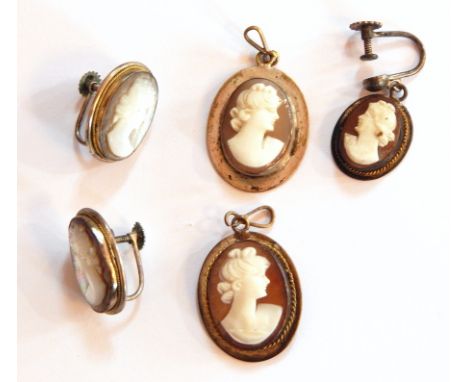 Pair silver and carved hardstone cameo earrings, oval female portrait decorated and three smaller carved shell cameos (5) 