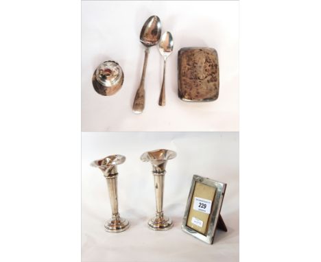 A quantity of small items of silver to include rectangular photograph frame, cigarette case, teaspoon, coffee spoon, jockey c