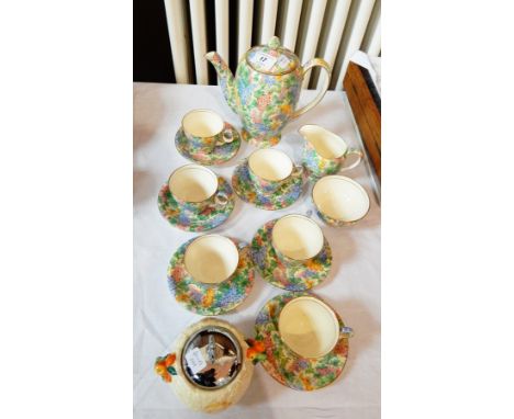 A Royal Winton part tea service decorated in floral pattern with gilt rim and a Clarice Cliff 'Celtic Harbour' sugar bowl  Li