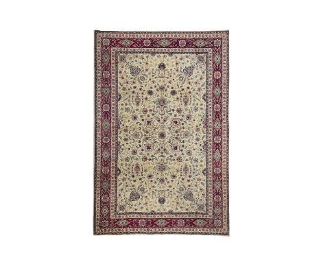 A FINE ANTIQUE HEREKE SIVAS CEZAEVI, TURKEY, 1940/50, Signed, 294 x 198cmThe central field woven with baluster vases filled w