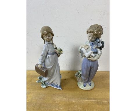 Two Lladro figures, one of boy holding puppy the other of girl with bouquet and travelling case, both also marked Selectors S