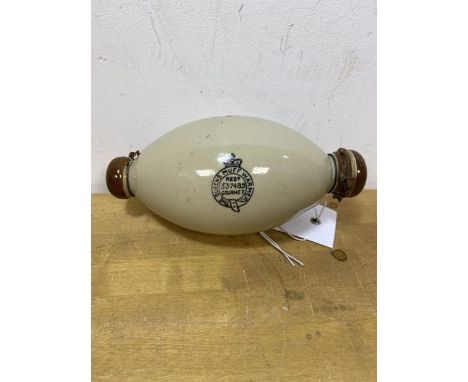 A late 19th early 20thc ceramic muff warmer inscribed The Queen's Muff Warmer measures 15cm