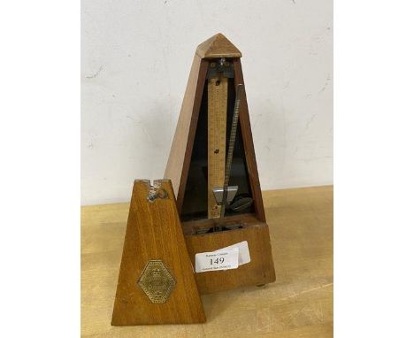 An early 20thc metronome by Metronome De Maeizel front bears plaque Metronome De Maeizel, measures 23cm high