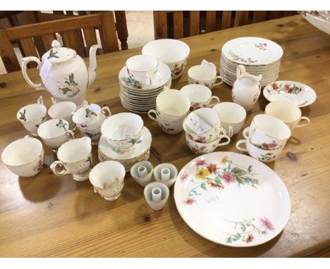 A mixed lot of china including twelve Royal Worcester teacups, side plates, milk jug, cake plates, also a Crown Staffordshire