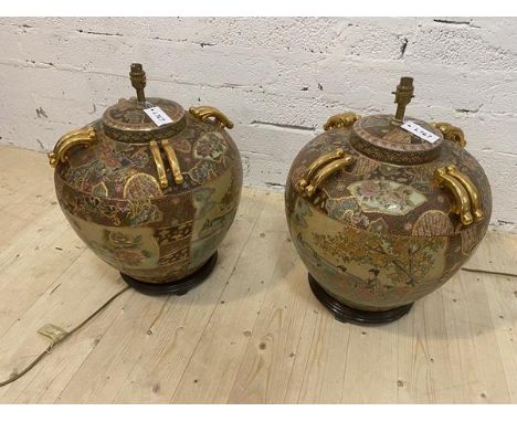 A pair of Japanese satsuma style large table lamps of squat baluster form, each measures 57cm to top of lamp holder, on woode