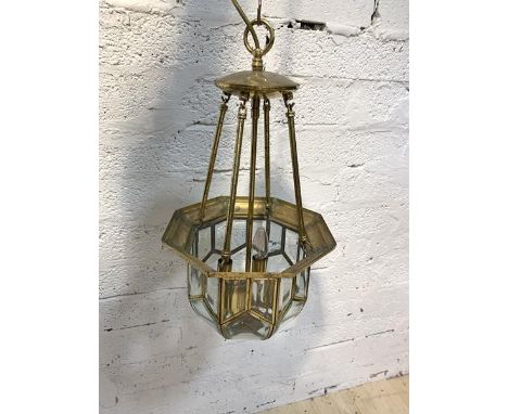 An Edwardian style brass ceiling pendent four branch light fitting, with sectional bevel glazed domed shade, (Shade height 23