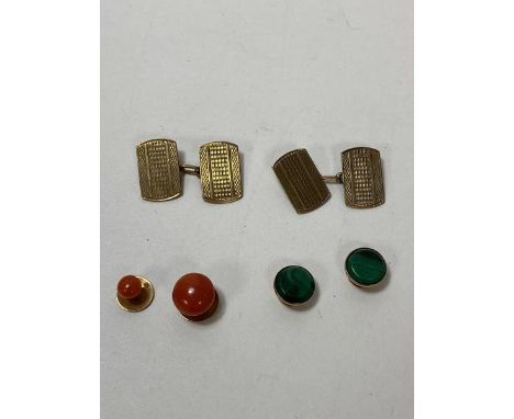 A pair of 9ct gold engine turned sleeve links each panel measures 1.5cm x 1 cm, combined weight of 5.66 grammes, also a pair 
