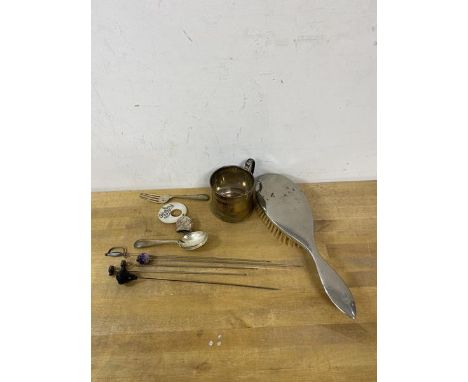 A 1930's Birmingham silver christening mug along with a silver child's spoon and fork, combined weight 106grammes, along with