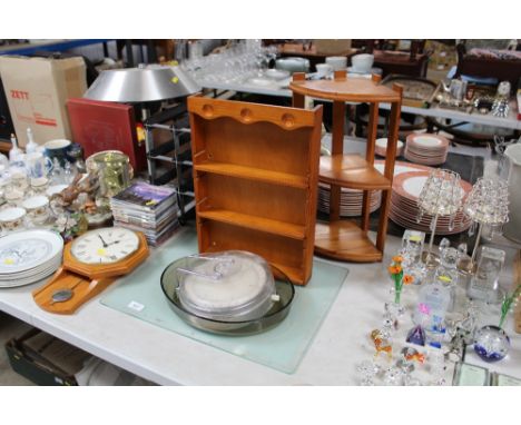 A wine rack, spice rack, kitchen scales, glass chopping board, wall clock, CDs, ornaments, table lamp, Royal Doulton plates e