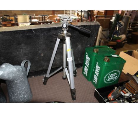 A Kenlock camera tripod