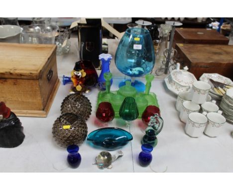 A collection of table glassware to include vases, dressing table items, Mdina paperweight, Murano style clown etc.