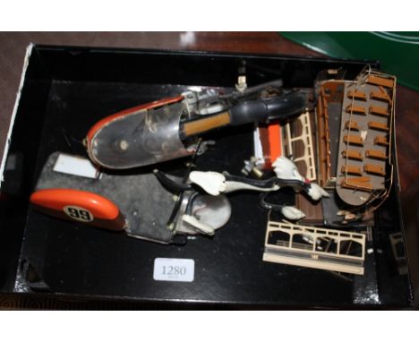 A vintage model of a motorcycle etc