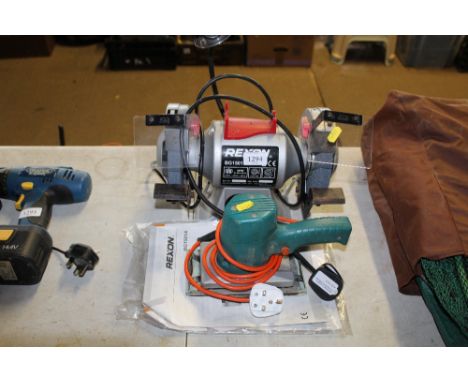 A Rexon orbital sander together with a Rexon bench grinder