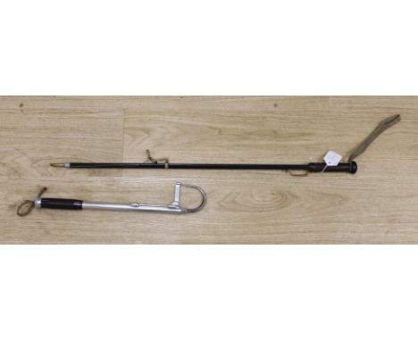 A vintage 3 draw salmon gaff and a tail-lifter