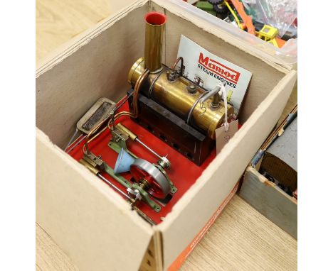 A Mamod steam engine, single cylinder with 6.5cm flywheel, in original box