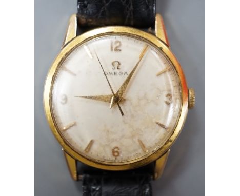 A gentleman's steel and gold plated Omega manual wind wrist watch, on associated leather strap.