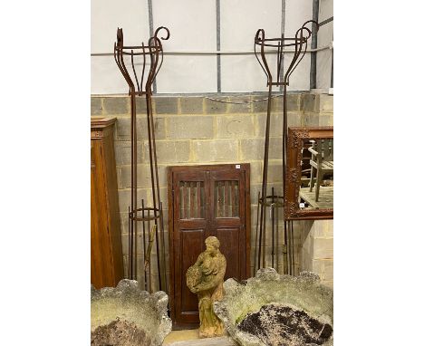 A pair tall wrought iron garden planter frames, height 27cm