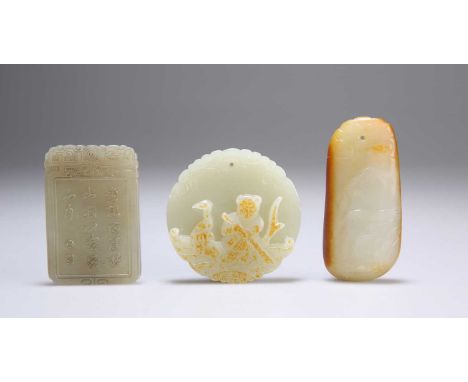 THREE CHINESE CARVED JADE PENDANTS comprising a rectangular pendant carved with a girl and toad; a circular pendant carved wi