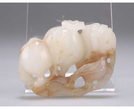 A CHINESE JADE CARVING in open work to depict peaches and leaves on a branch. 6.5cm wideIn good condition.