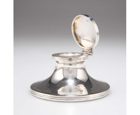 A GEORGE V SILVER INKWELL by W J Myatt &amp; Co, Birmingham 1925, of capstan form, with reeded base rim, weighted. Base 8.3cm