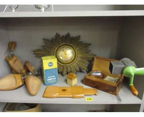 A vintage lot to include shoe stays, a Taylor navigator compass and a sunburst wall clock A/F