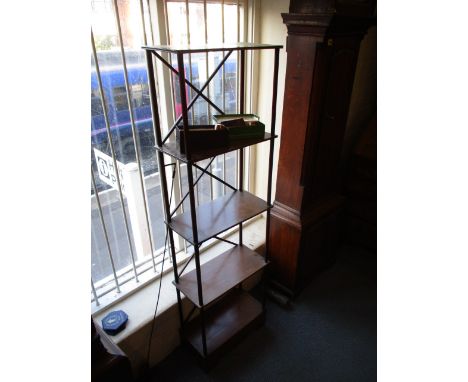 A Regency mahogany what not having five tiers with spindle supports and cross over backs, raised on bracket feet, 55 3/4 h, 1
