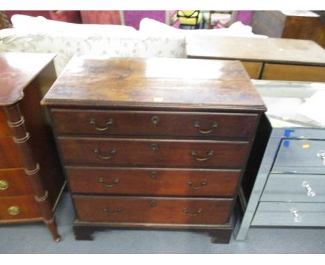 A George III mahogany chest of four graduated long drawers, raised on bracket feet, 36 h, 34 w, 18 d