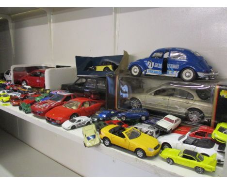 A selection of model diecast toy cars to include a 1995 Mattel Malaysia Road Rocket, a quantity of Hotwheels and a Durago VW 