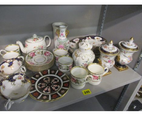 A mixed lot of china to include a pair of Dresden vases, a Derby Imari pattern platter, Worcester cups and other items