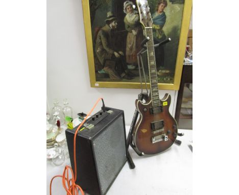 A Hondo II electric guitar, an Arbiter guitar stand and an Akays 10 amplifier