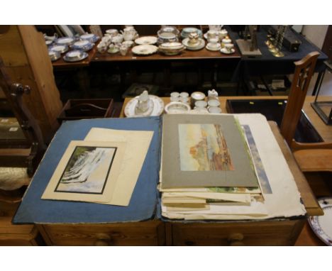 A folder of drawings, pictures and prints 