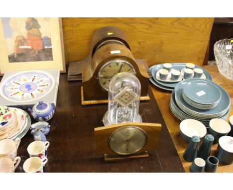 Three various mantel clocks and an anniversary clock