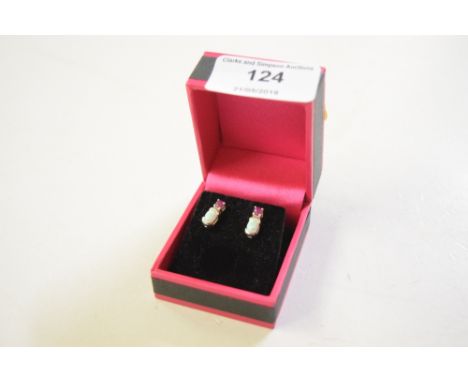 A boxed pair of ruby and opal set ear-rings 