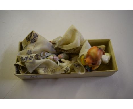 A Goebel figure group; two half pin dolls (one AF); a souvenir silk handkerchief from Canada etc.