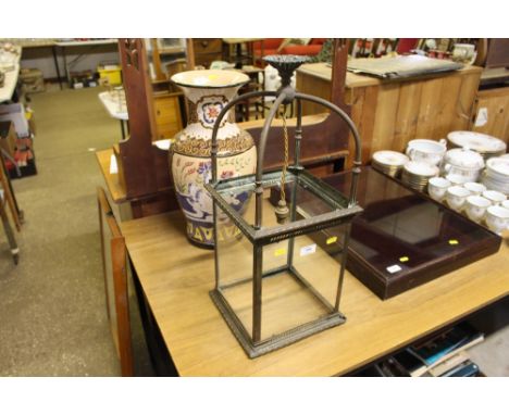 A brass and glass lantern 
