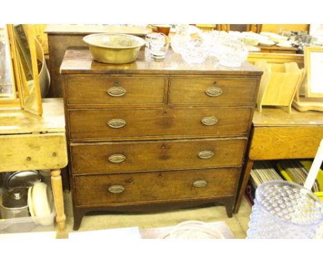 A 19th Century mahogany chest fitted two short over three ling drawers, raised on bracket feet