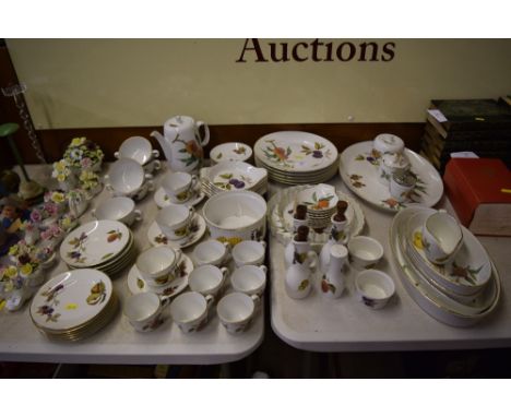 A quantity of Royal Worcester "Evesham" china to include dinner plates, coffeeware, soup bowls etc.